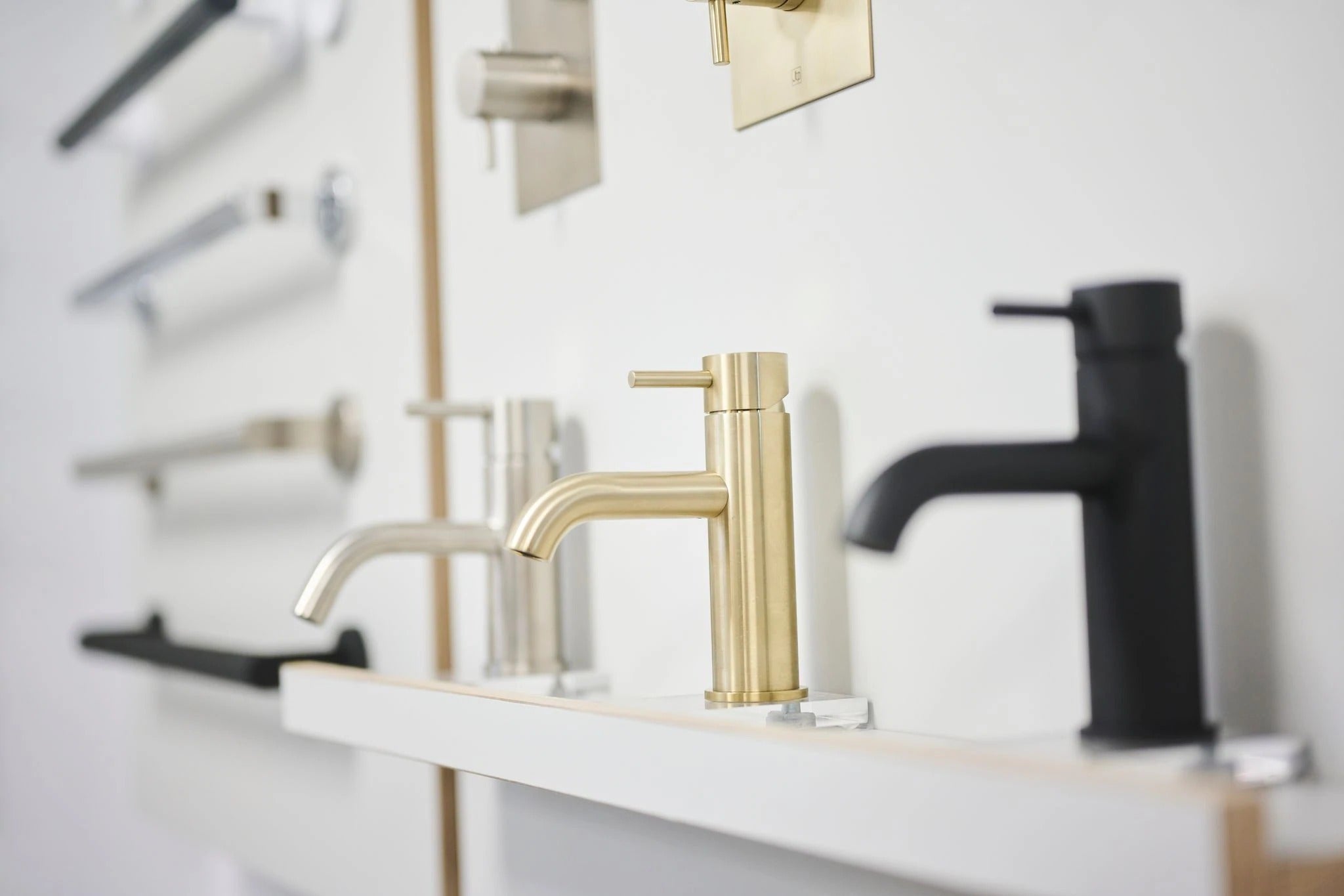 grab rails and taps of different finishes in Fine & Able showroom